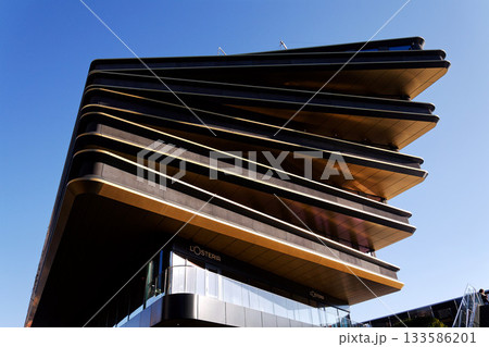 Masarycka MSD Masaryk Station Development office and retail building by Zaha Hadid Architects with golden facade on November 19, 2025 in Prague, Czech Republic. Masarycka MSD Masaryk Station Development office and retail building by Zaha Hadid Architects with golden facade on November 19, 2025 in Prague, Czech Republic. 133586201