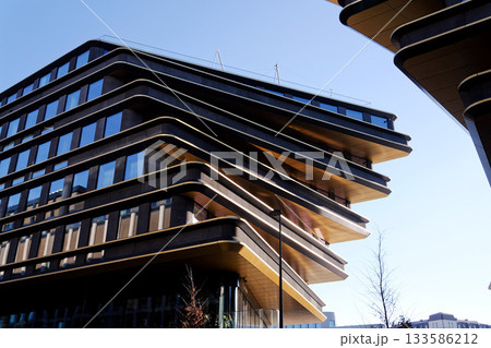 Masarycka MSD Masaryk Station Development office and retail building by Zaha Hadid Architects with golden facade on November 19, 2025 in Prague, Czech Republic. Masarycka MSD Masaryk Station Development office and retail building by Zaha Hadid Architects with golden facade on November 19, 2025 in Prague, Czech Republic. 133586212