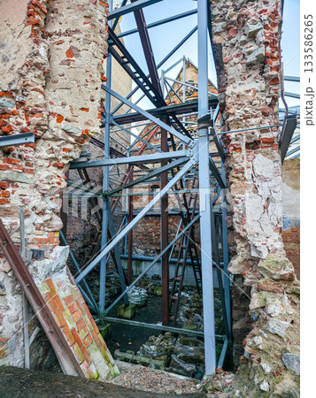 Historic brick ruins with exposed steel supports during preservation work in Riga, Latvia Historic brick ruins with exposed steel supports during preservation work in Riga, Latvia 133586265