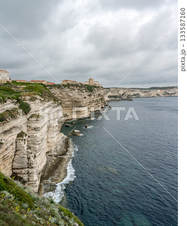 Aerial view marina cape Bonifacio south Corsica France citadel on rocky promontory on wild white limestone cliffs Aerial view marina cape Bonifacio south Corsica France citadel on rocky promontory on wild white limestone cliffs 133587160