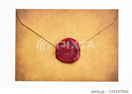 Vintage Sealed Envelope. An aged paper envelope sealed with a red wax stamp 133587692