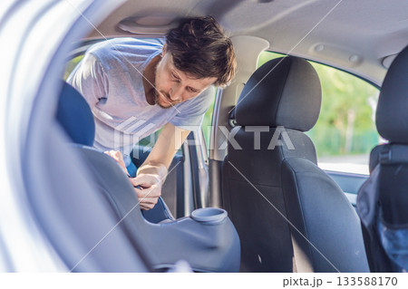 Man cleaning the interior of his car, wiping surfaces and organizing the vehicle, concept of cleanliness, maintenance and everyday routine 133588170