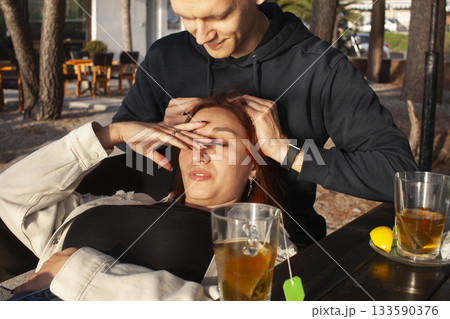 young couple in cafe outdoor, lifestyle people concept young couple in cafe outdoor, lifestyle people concept 133590376