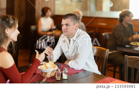 Young couple having dinner at restaurant Young couple having dinner at restaurant 133593091