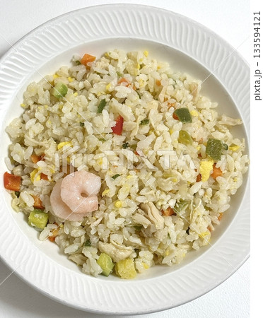 Nasi goreng, Indonesia's iconic fried rice dish, stir-fried with a blend of garlic, soy sauce, and spices. Often served with a fried egg, crispy crackers, and pickles, it's a flavorful and satisfying. Nasi goreng, Indonesia's iconic fried rice dish, stir-fried with a blend of garlic, soy sauce, and spices. Often served with a fried egg, crispy crackers, and pickles, it's a flavorful and satisfying. 133594121
