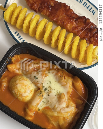 Bunsik, a popular Korean street food, includes various dishes like tteokbokki, odeng, and gimbap. It's a tasty, comforting snack loved by many, perfect for casual gatherings or quick bites. Bunsik, a popular Korean street food, includes various dishes like tteokbokki, odeng, and gimbap. It's a tasty, comforting snack loved by many, perfect for casual gatherings or quick bites. 133594317