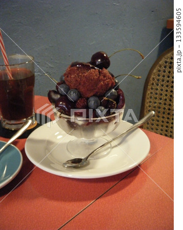 Light and creamy desserts with delicate layers, fresh fruits, and rich flavors, paired with refreshing sweet drinks. A perfect café treat for a delightful and indulgent experience. Light and creamy desserts with delicate layers, fresh fruits, and rich flavors, paired with refreshing sweet drinks. A perfect café treat for a delightful and indulgent experience. 133594605