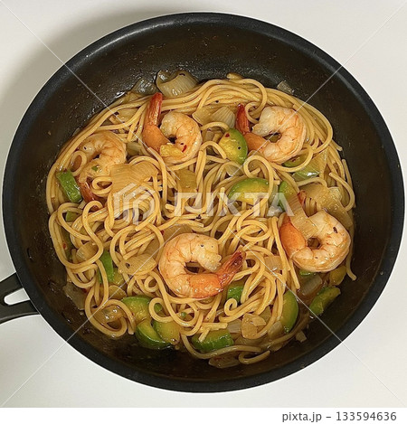 Gambas spaghetti with succulent shrimp, garlic, olive oil, and chili flakes—a perfect fusion of seafood richness and Italian flavor in every bite. Gambas spaghetti with succulent shrimp, garlic, olive oil, and chili flakes—a perfect fusion of seafood richness and Italian flavor in every bite. 133594636