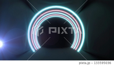 Glowing concentric cyan and magenta neon arches illuminating dark corridor, with lens flare beams 133595036