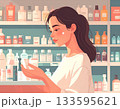 商品棚の前で商品を選ぶ女性 133595621
