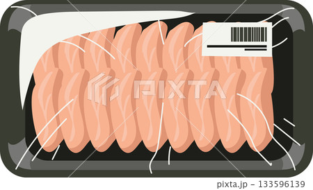 Top view of packaged raw chicken breast slices in sealed plastic tray with barcode label for grocery store 133596139