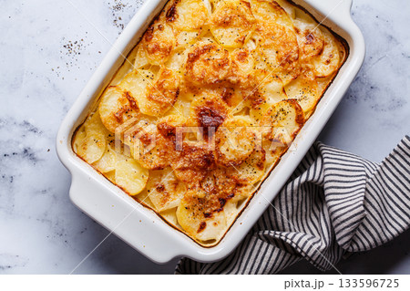 French classic potato gratin dauphinois. French classic potato gratin dauphinois. 133596725