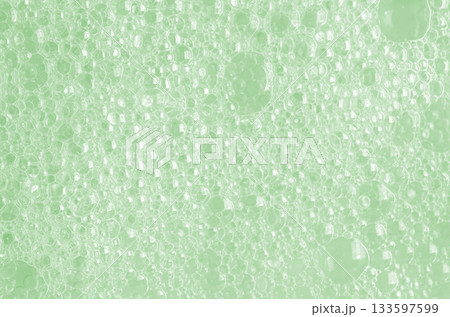 Bubbles of body gel or soap foam or shaving gel. Closeup. 133597599