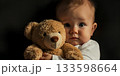 cute little girl with a teddy bear 133598664