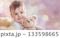happy baby girl with toy bear 133598665