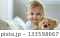 baby girl with toy bear 133598667