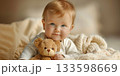 baby girl with toy bear 133598669