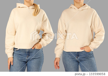 Showcasing two variations of casual beige hoodies worn with jeans 133599058