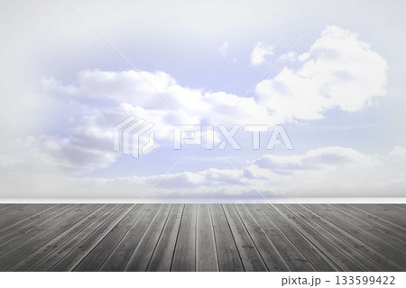 Minimalist wooden plank floor is stretching toward divider in flat style, with cloudy sky backdrop 133599422