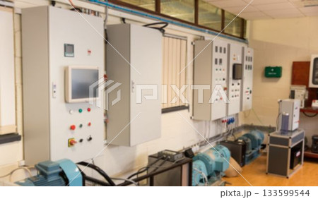 Wall-mounted control cabinet is powering electric motors in flat design equipment room with windows Wall-mounted control cabinet is powering electric motors in flat design equipment room with windows 133599544