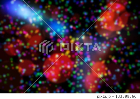 Cluster of multi-colored bokeh lights is filling digital background with blurred circles 133599566