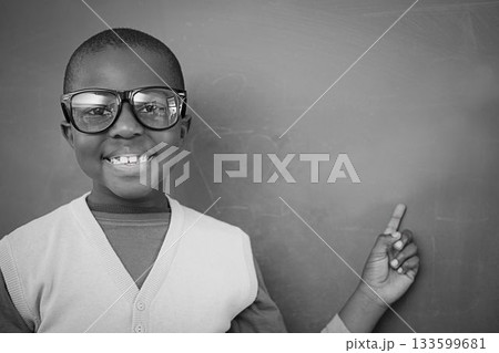 Schoolchild with blackboard 133599681