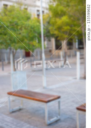 Defocused image of empty bench at park 133599682