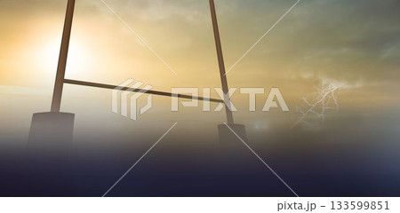 Flat design showing H-shaped goal post rising in fog with sun casting glow and lightning flashing 133599851
