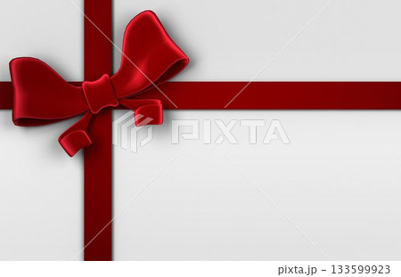 Glossy red ribbon and decorative bow are being shown on flat minimalist design with white backdrop Glossy red ribbon and decorative bow are being shown on flat minimalist design with white backdrop 133599923