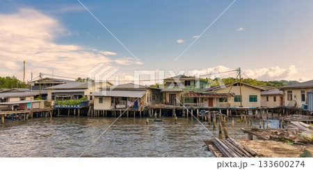 Kampong Ayer water village with Raja Isteri Pengiran Anak Hajah Saleha Bridge in the far end, Bandar Seri Begawan, Brunei. Kampong Ayer water village with Raja Isteri Pengiran Anak Hajah Saleha Bridge in the far end, Bandar Seri Begawan, Brunei. 133600274