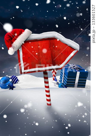 Flat design arrow sign standing on candy-cane post in snowfall, wearing Santa hat, blue gifts 133601527