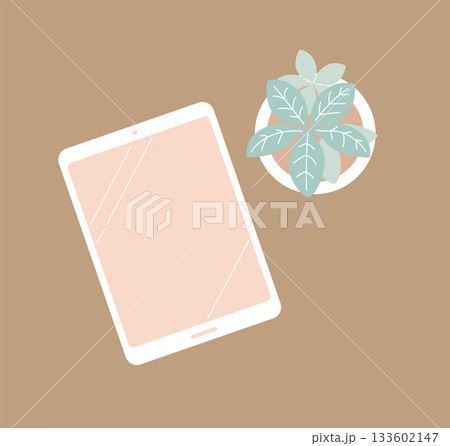 くすみカラーのタブレットと観葉植物／リラックスデスクのフラットレイ（背景色あり） 133602147
