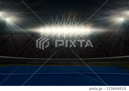 Digitally generated image of blue tennis court illuminate by spotlight 133604819