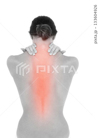 Woman experiencing back pain Woman experiencing back pain 133604926