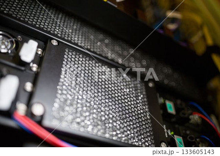 Honeycomb mesh panel is being shown in 3D render interior, featuring fans, power connectors, cables 133605143