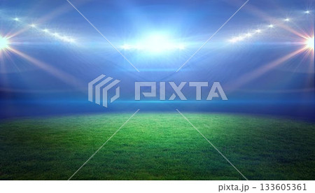 Empty grass pitch is being floodlit at night, casting blue-white beams on transparent background Empty grass pitch is being floodlit at night, casting blue-white beams on transparent background 133605361