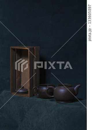 Still life with teapot, cup and wooden box Still life with teapot, cup and wooden box 133605897