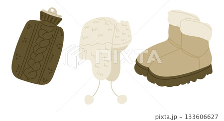 Cozy winter accessories including a knitted hot water bottle cover, a fluffy hat and warm boots are shown in a soft minimal style. The concept conveys warmth, comfort and seasonal essentials Cozy winter accessories including a knitted hot water bottle cover, a fluffy hat and warm boots are shown in a soft minimal style. The concept conveys warmth, comfort and seasonal essentials 133606627