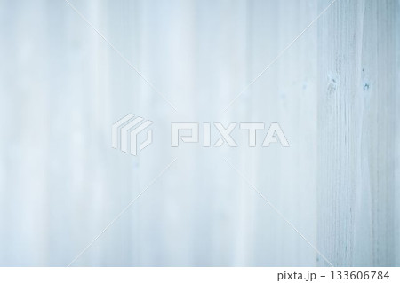 Vertical wooden planks are being displayed in flat design, showing subtle grain and pale blue paint Vertical wooden planks are being displayed in flat design, showing subtle grain and pale blue paint 133606784