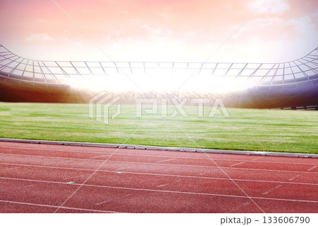 Red rubber running track and green field are appearing in flat design stadium under sunrise sky Red rubber running track and green field are appearing in flat design stadium under sunrise sky 133606790