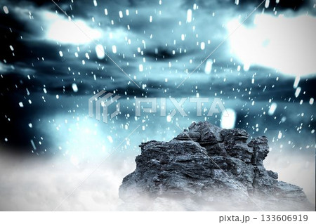 Large rock overlooking snowy sky Large rock overlooking snowy sky 133606919