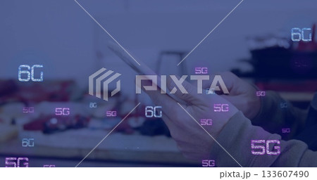 Holding smartphone, female hands tapping over cluttered lab bench, with floating 5G and 6G labels 133607490