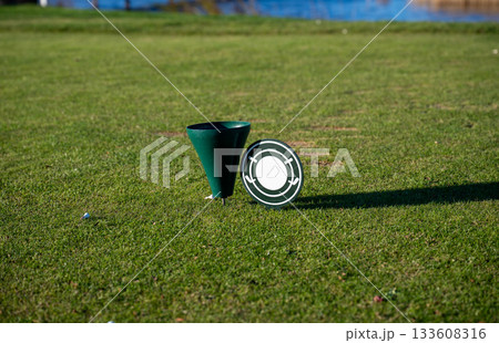 golf tee marker on green grass field 133608316