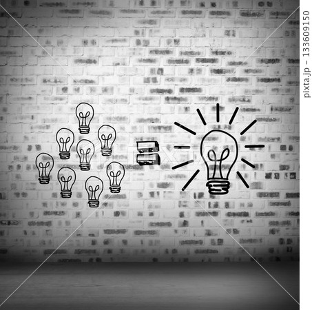 Light bulbs at brick lined wall 133609150