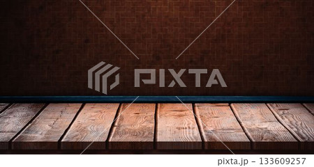 Wooden shelf on brown brick wall Wooden shelf on brown brick wall 133609257