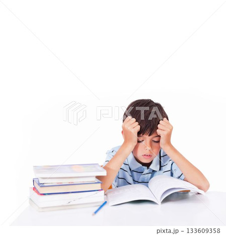 Cute pupil reading at desk Cute pupil reading at desk 133609358