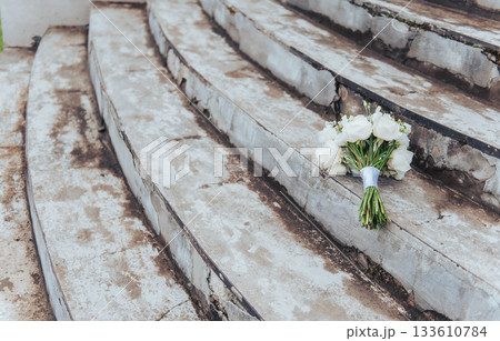 Bridal Bouquet on Historic Stone Steps Bridal Bouquet on Historic Stone Steps 133610784