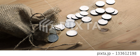 Silver coins in the bag Silver coins in the bag 133612198