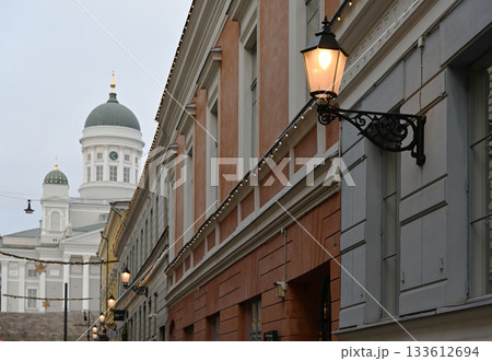 An atmospheric street-level view in central Helsinki featuring historic buildings An atmospheric street-level view in central Helsinki featuring historic buildings 133612694