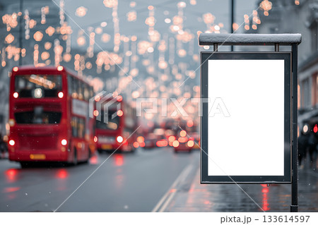 Snowy Oxford Street banner with festive bokeh and softly blurred red buses 133614597